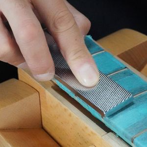 Hovedbilde B&aring;ndfil level for b&aring;nd av rustfritt st&aring;l 